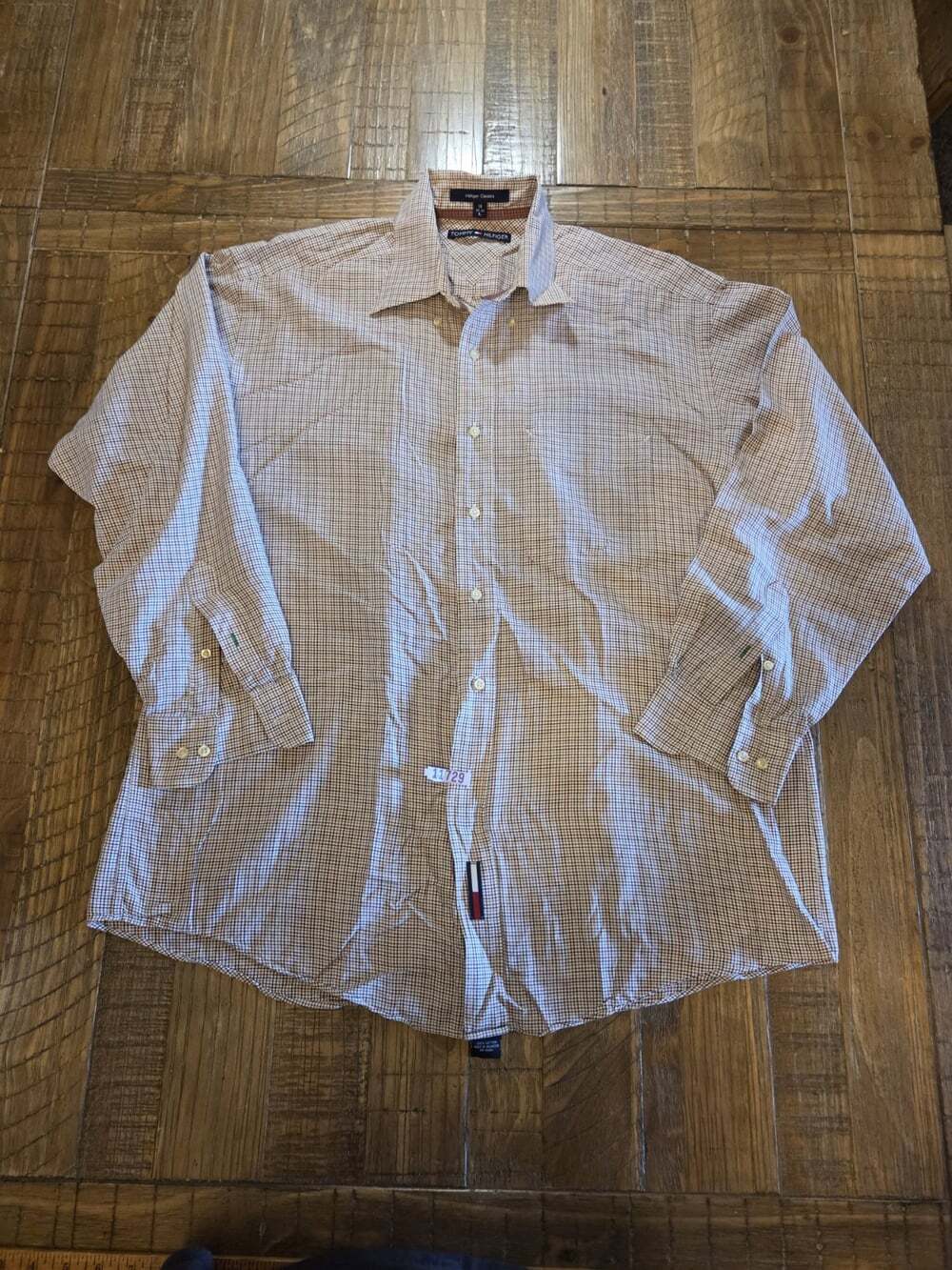 vintage Tommy Hilfiger long-sleeve button-down shirt featuring a multi-color...
